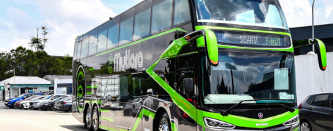 Un bus touristique à double étage Scania (photo d'illustration).