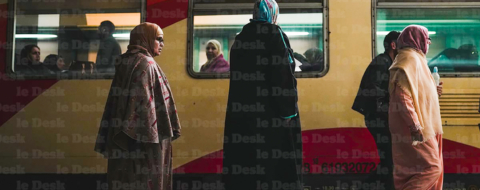 Des voyageurs devant un train de l'ONCF (photo d'illustration).
